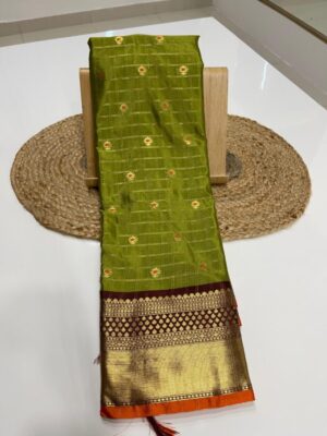 silk meena buti weave with  with pista zari butis inside allover