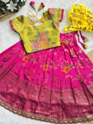 Beautiful flower position work blousev paired with golden zari pure tissue skirt