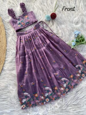 Elegant gold crush fabric skirt set featuring bird motifs and a ruffled top, perfect for festive charm and playful style