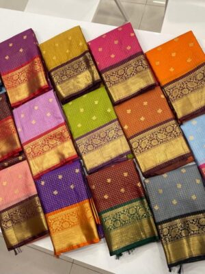 Bringing you all the exclusive vintage  checks weaving buty allover on semi-gadwal inspired saree