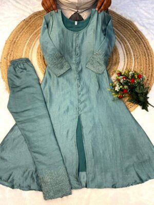 Crafted in luxurious blooming vichitra silk, this elegant A-line kurta  set is adorned with beautiful sleeve and pant handwork this work highlight rich look of the outfit.This fabric is very soft and shiny.this is perfect for all kind of upcoming occasion