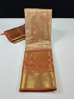Presenting you all the premium soft Banarasi tissue silk saree with zari weaving buty allover saree having weaved kanchi inspired border in self shade